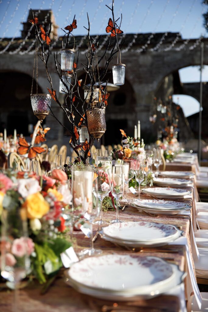 table decor with colorful flowers and butterflies