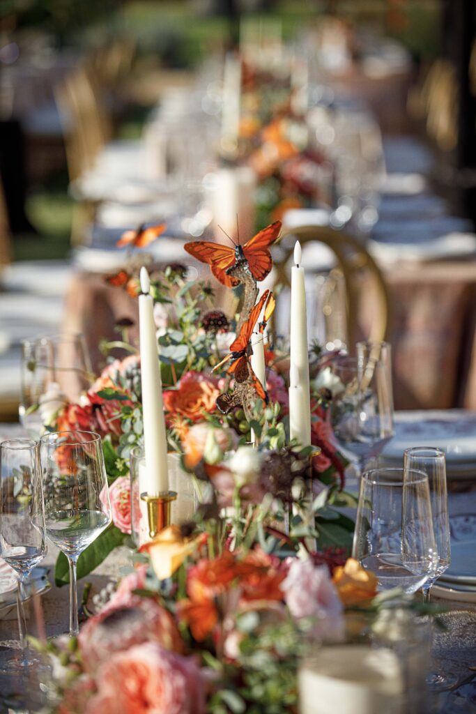table decor with colorful flowers and butterflies