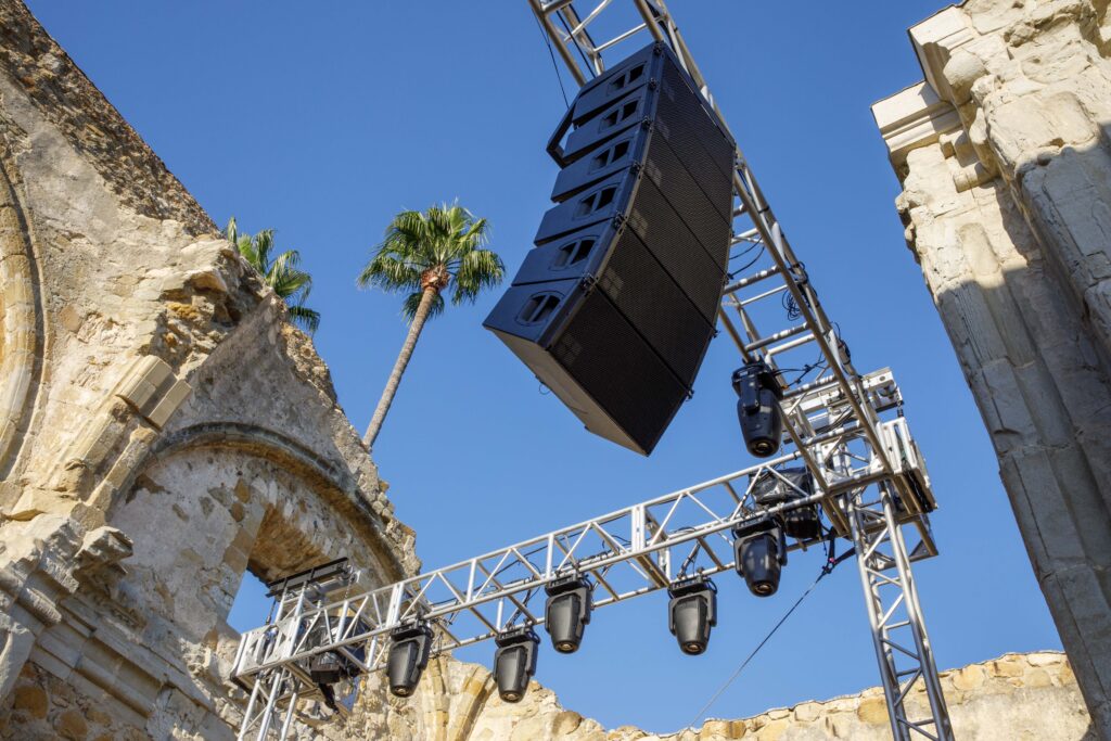 lighting and sound equipment getting set up for gala event
