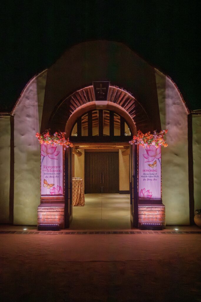 entrance lit up with the gala event details