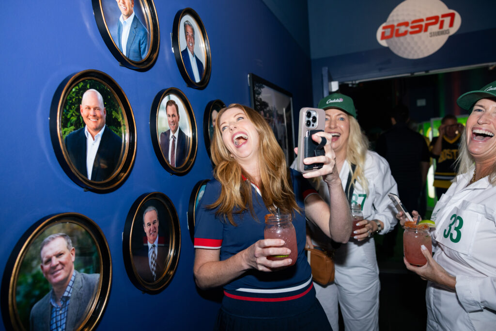 guests taking pictures with the people in the walk of fame