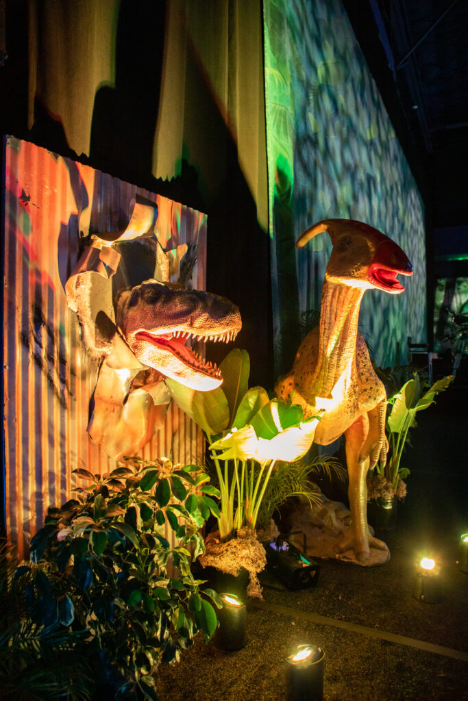 life-sized dinosaurs and jungle created for the prehistoric event theme 