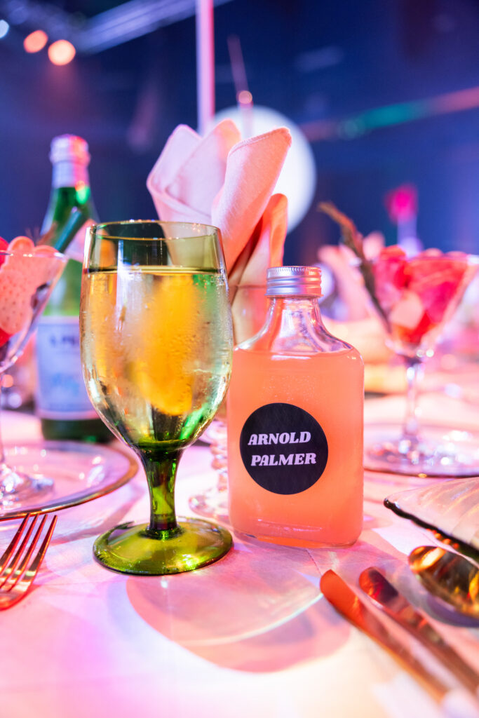 table decor and arnold palmer drink for the golf event theme