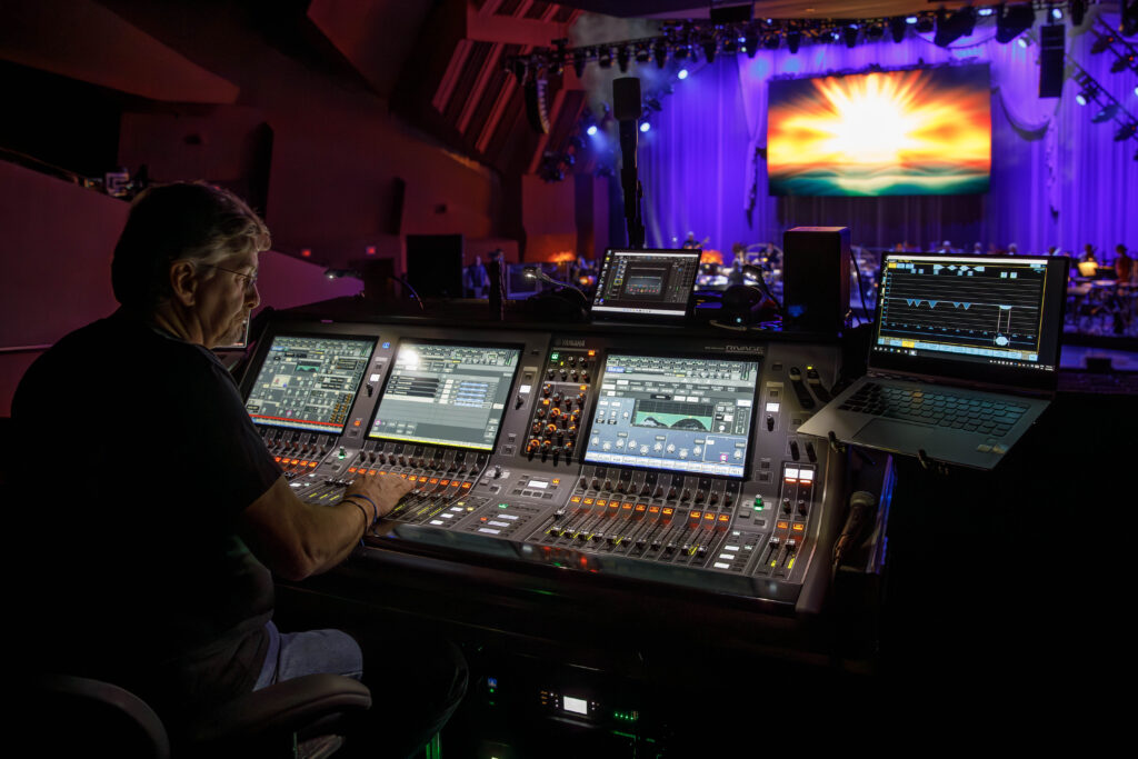 audio visual team working on lighting and sound for event