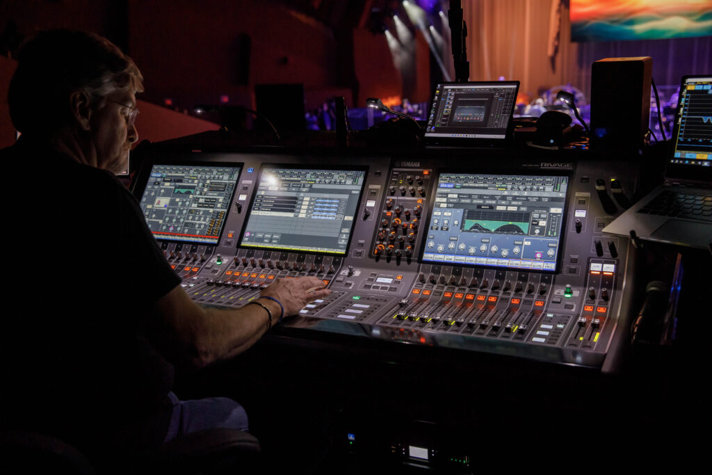 audio visual team working on lighting and sound for event