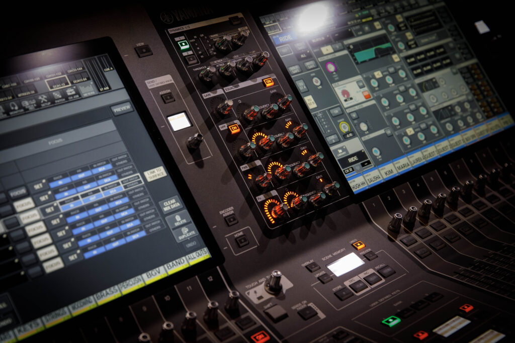 audio visual team working on lighting and sound for event