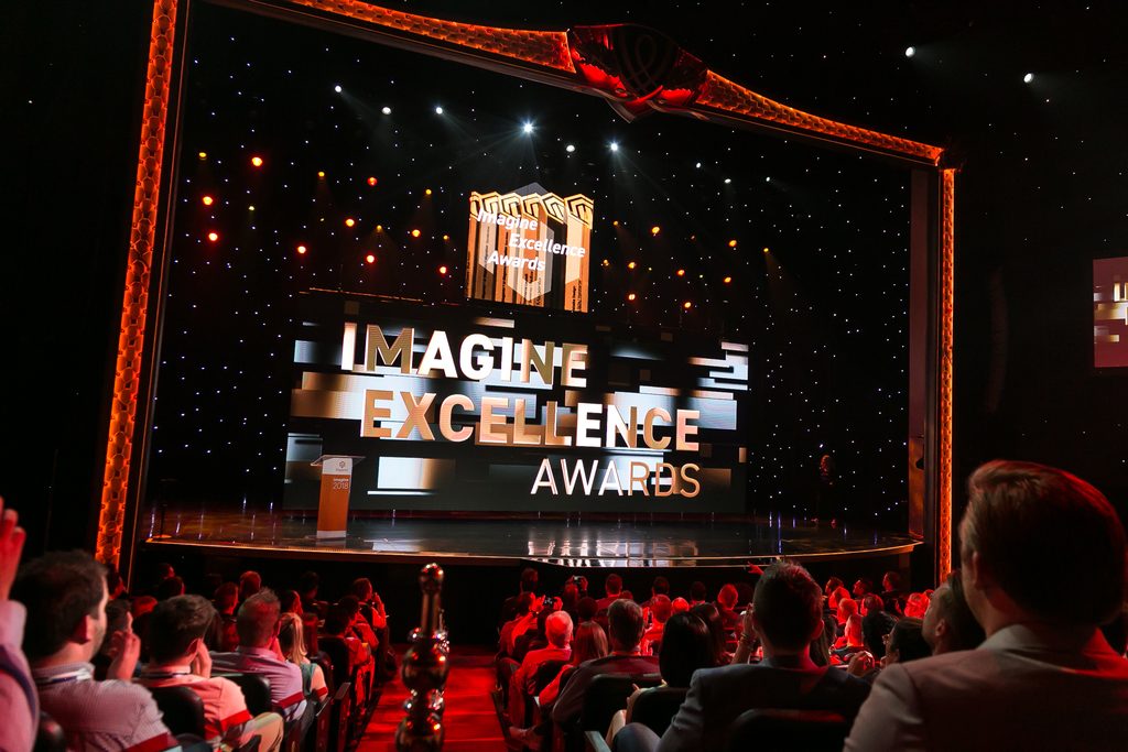 LED screens on stage at conference