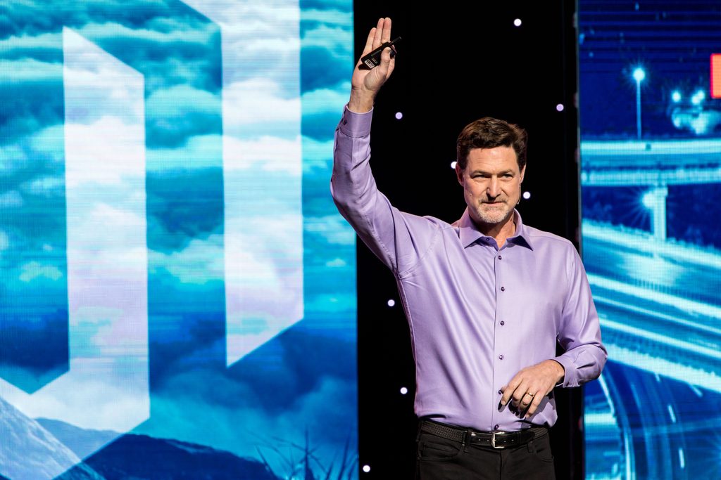 speaker waves in front of LED screens