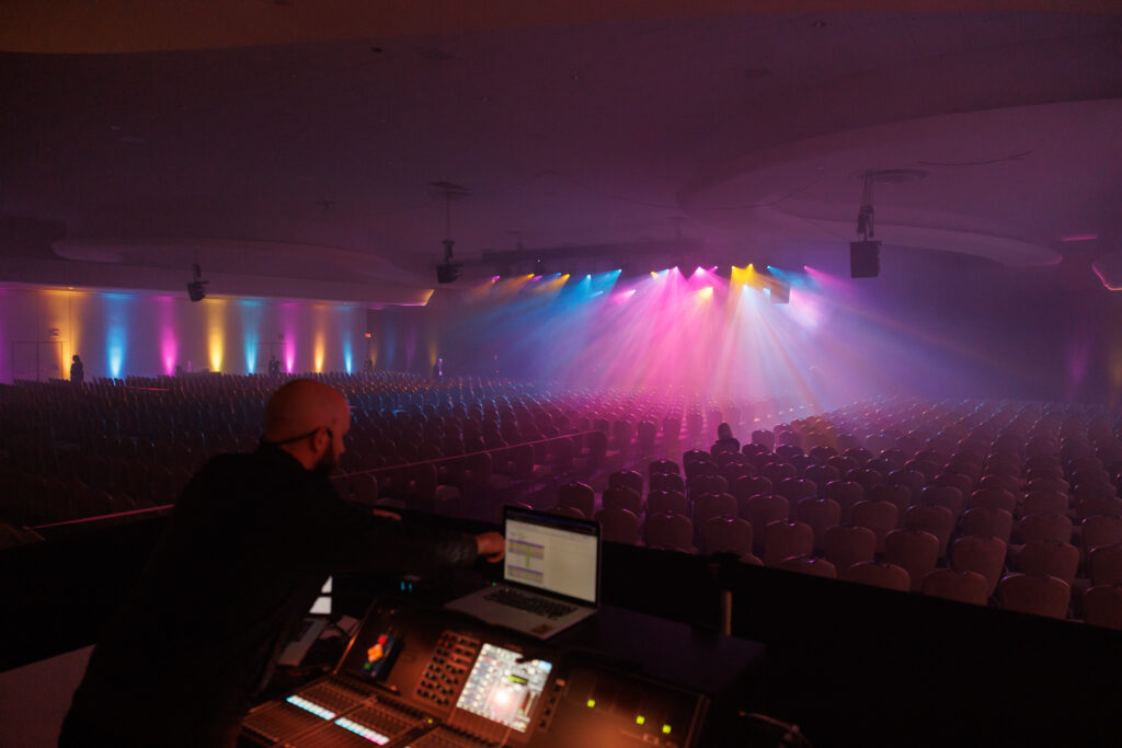 production team working on sound and lighting