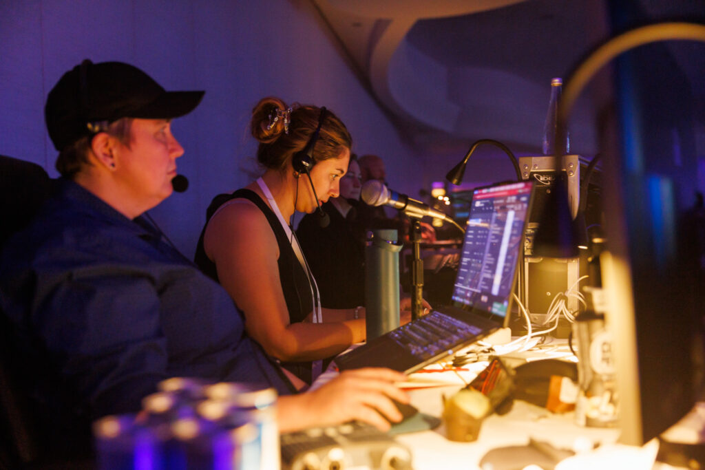 production team working on sound and lighting