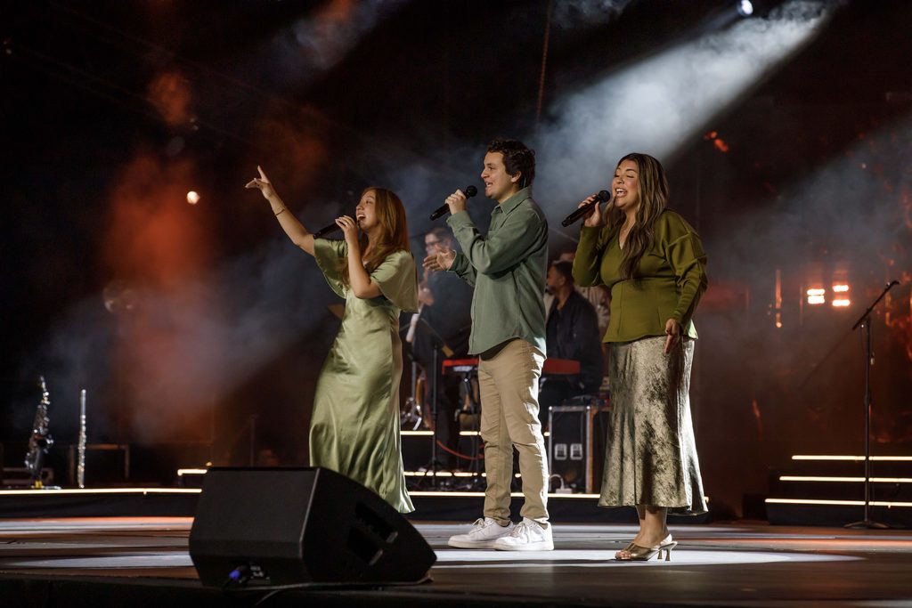 singers on stage at live event