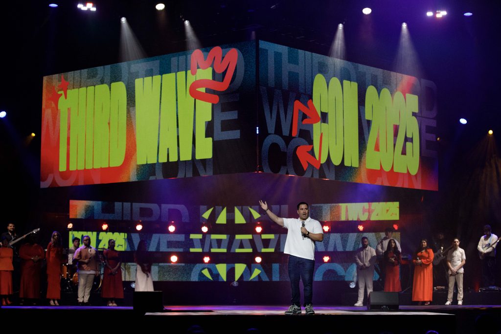 LED screens on stage with speaker at Anaheim Convention Center