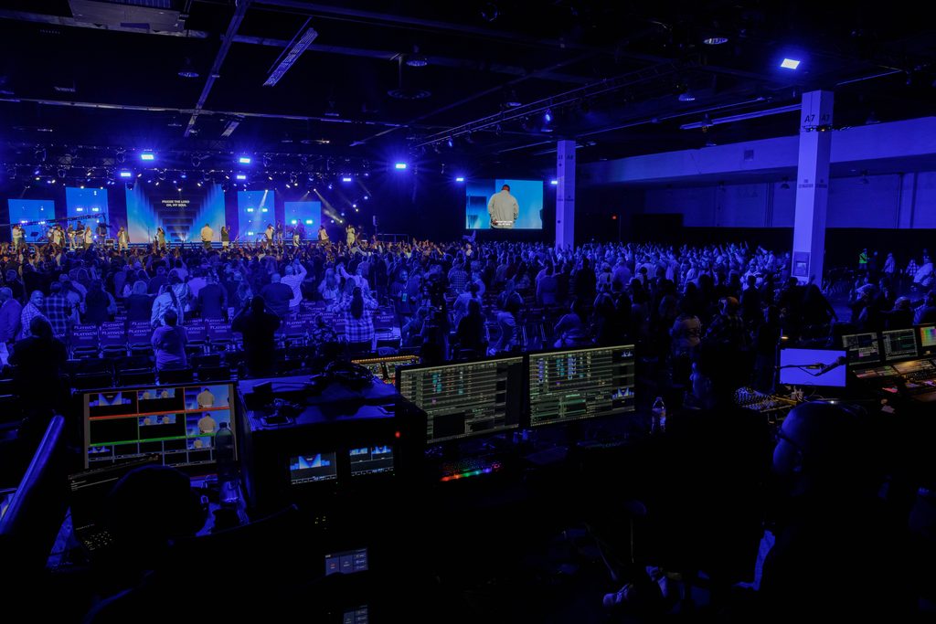 performers on stage with audience at Anaheim Convention Center