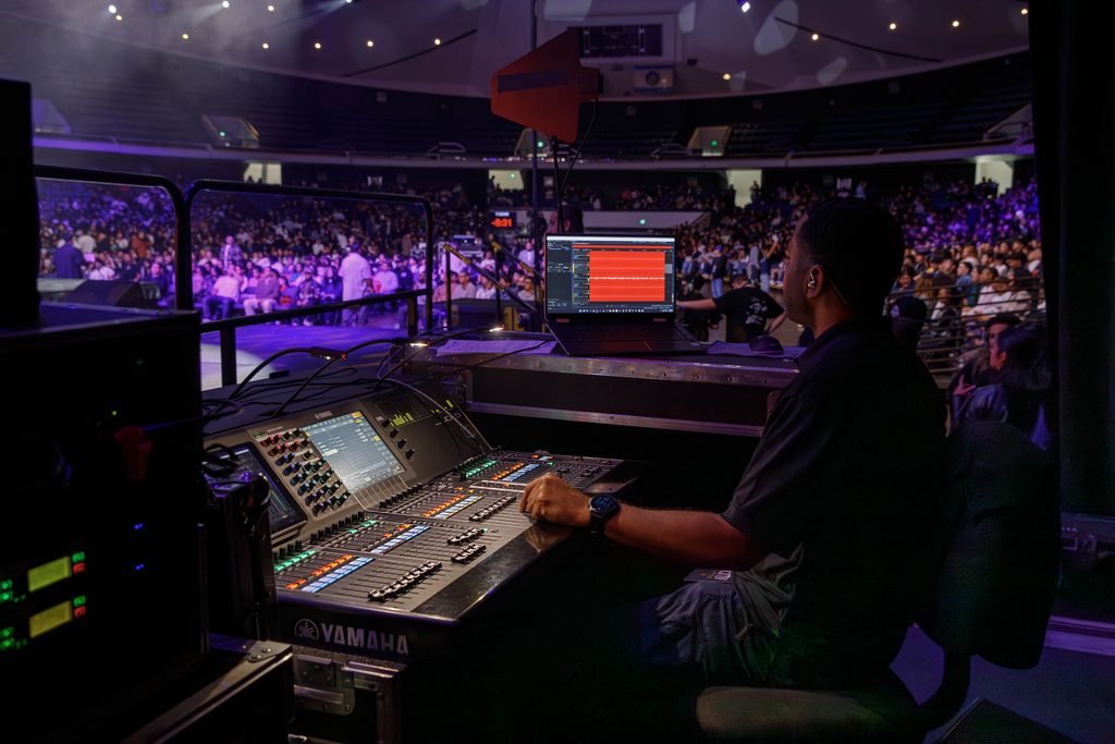 technician at sound and lighting board